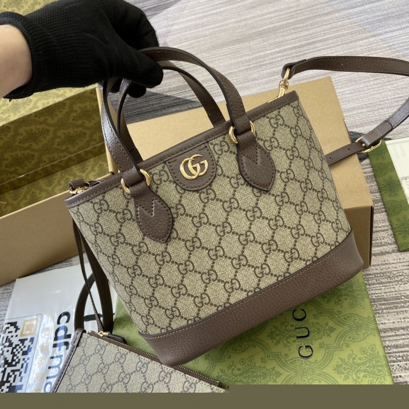 G*u*i shopping bags